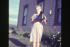 Beulah Lenora Kerr McIntosh Laing holding Richard port's military hat, 1968